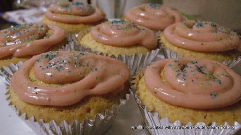 fluffy vanilla cupcakes with strawberry frosting